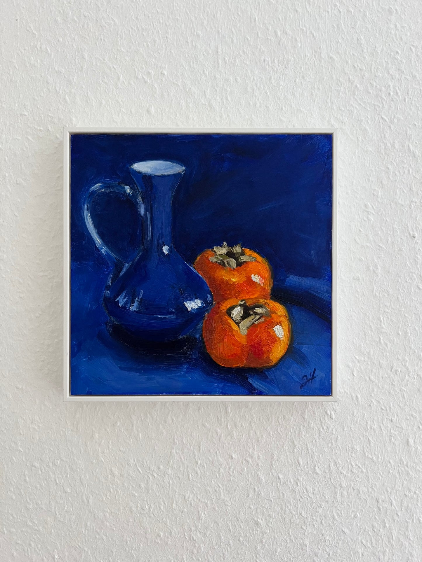 "Persimmons and blue vase"