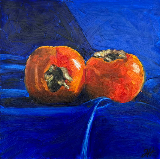 Persimmons on royal blue
